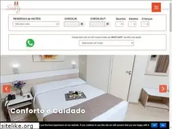Sites similar to hoteissuarez.com.br